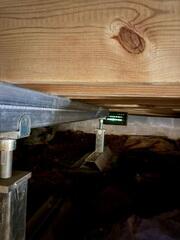 Support sagging crawl space beams and level your floor
