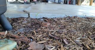 Soil settlement beneath the concrete slab had caused it to sink and crack.