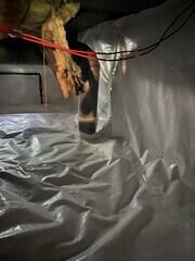 Vapor barrier cut in around HVAC line