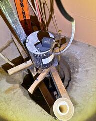 An Inventive Way To Keep A Sump Pump In Place