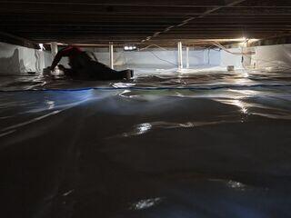 Sealing Crawl Space with Moisture Barrier