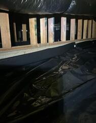 Vapor Barrier Overlapped Along Crawl Space Wall