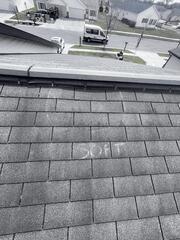 The marked area shows where the roof's decking has sustained water damage. This section is beginning to cave in, which will allow water to seep into the attic and the interior of the home.