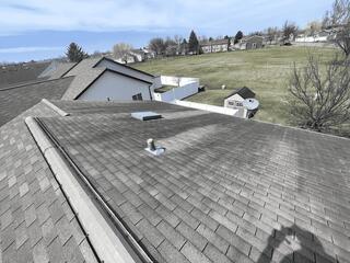 Years of storms have thinned out these asphalt shingles. Time for a new roof replacement.
