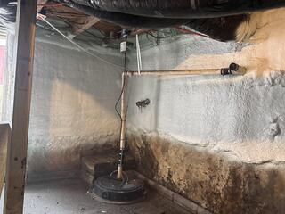 Spray foamed foundation walls