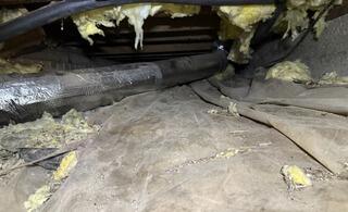 Torn Vapor Barrier