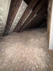 Attic Insulation is blown into the space, creating a functional heat barrier that will keep all heat inside of this home during cold months.
