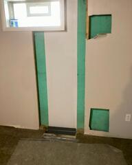 Basement Wall Crack Leaking in Niagara Falls, NY Is Plugged and Patched