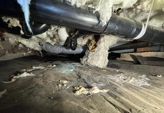 Fallen Fiberglass Insulation