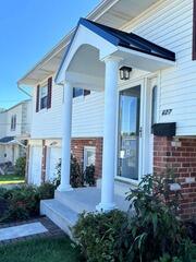 A Grand New Entrance: Custom Portico Transformation