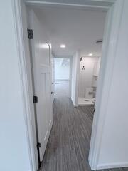 Looking into the Bathroom from the bedroom both the bedroom and the door by the living space has a door that can be shut
