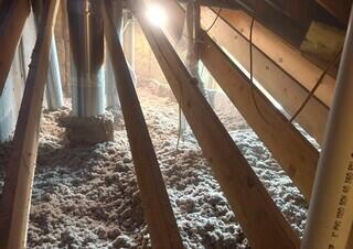 Blown-In Insulation Installed in Attic