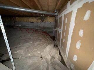 Dirty, damp crawl space