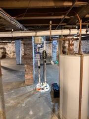 New Concrete Floor & TripleSafe Sump Pump