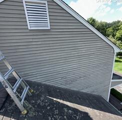 explore our exterior painting solution for high-gable walls, garage trim, and entryway details in Newtown, CT.
