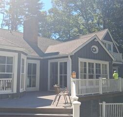 Deep power washing and prepping outdoor decks to ensure long-lasting stain and paint adhesion