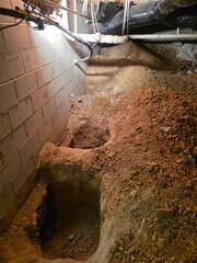 Preparing the Foundation for Helical Pier Installation