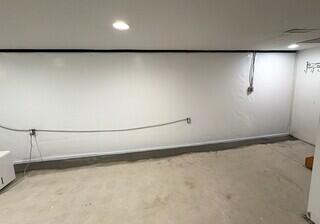 This basement is now completely functional for the homeowners to enjoy thanks to the installation of their waterproofing system that has created a dry, healthy, and clean space.