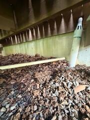 Concealing a discharge outlet