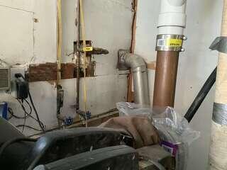 Basement/living area before the new radon mitigation piping was installed.