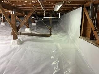 Crawl Space Vapor Barrier Along Foundation Wall