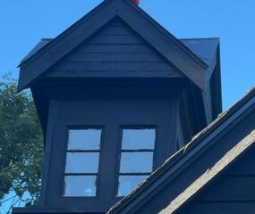 Restored architectural details and cupola window trim built to withstand the elements.