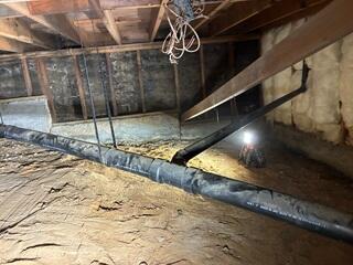 Exposed Dirt Crawl Space Before Encapsulation in Poway, CA