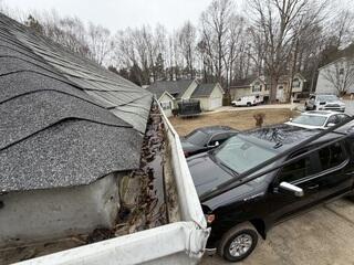 Gutter is damaged and pooling water