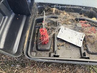 When checking our rodent bait stations at this property, we found one that had a black widow in it!