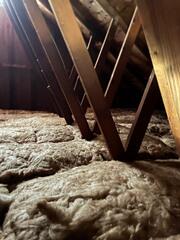 Previously, there was a leak in the attic that lead to a mold issue. Although the leak was repaired, mold had grown throughout the insulation.