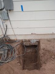 Foundation Excavation for Helical Pier Installation