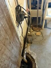 This home's original sump pump had failed at keeping water out of the basement, leading our crew to install our newest sump pump system.