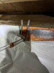 Vapor Barrier Fitted Around Crawl Space Support
