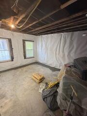 Basement Drainage System Cemented into Foundation Floor