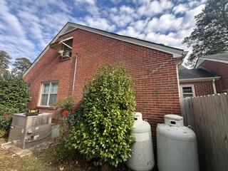 Stair-Step Cracks Along Exterior Brick Wall