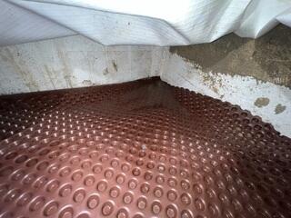 Underlayment Beneath the Crawl Space Vapor Barrier