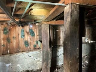 Wooden Support Posts and Foundation Wall Cracks