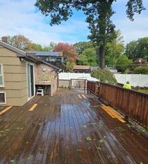 Targeted board replacement and wood repair to prep large residential decks for long-lasting protection.