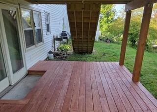 Freshly sealed down deck platform featuring smooth, splinter-free floorboards and reinforced safety railings.
