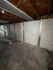Our crew installed our braces along each wall of the basement to ensure the issue would not persist. Now the home's walls will straighten over time and return to their original position.