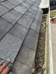 Removal of the top section of metal gutter