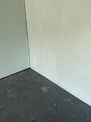 Signs of foundation settlement were evident throughout the home, including gaps between the concrete foundation slab and the adjoining walls.