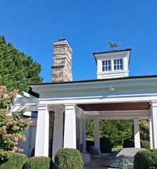 White Columns & Pergola Deep Cleaning - Professional soft washing and pressure cleaning to remove grime and mildew from luxury outdoor pavilion structures.