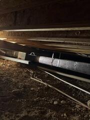 Supplemental Steel Beam Preparation Beneath the Home