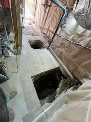 Foundation Repair Access in a Narrow Utility Area