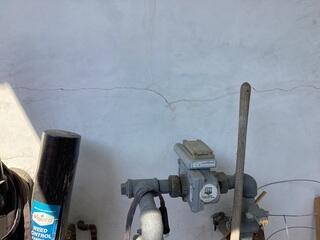 Exterior Stucco Crack Near the Gas Meter