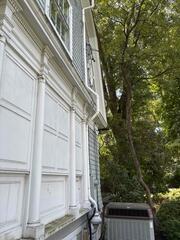 Exterior Radon Piping Along the Home
