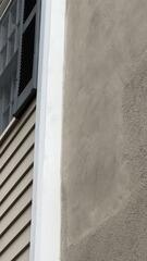 After restoration: Fully sealed, recaulked, and painted trim joints providing total moisture protection.