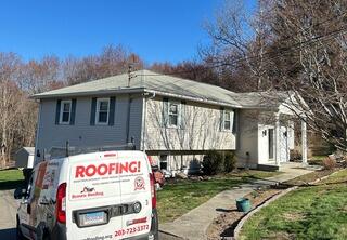 Aging Three-Tab Roof Before Replacement