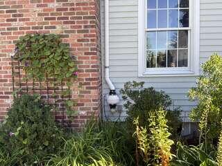 Exterior Radon Fan and Vent Pipe - Before